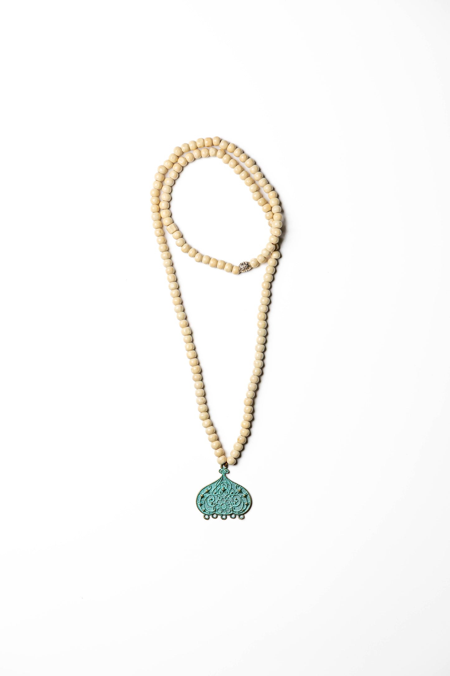 Bohemian Ivory Beaded Necklace with Ornate Turquoise Pendant